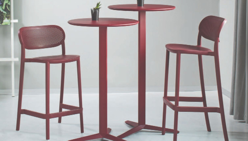 two olivia barstools next to two matching bar tables