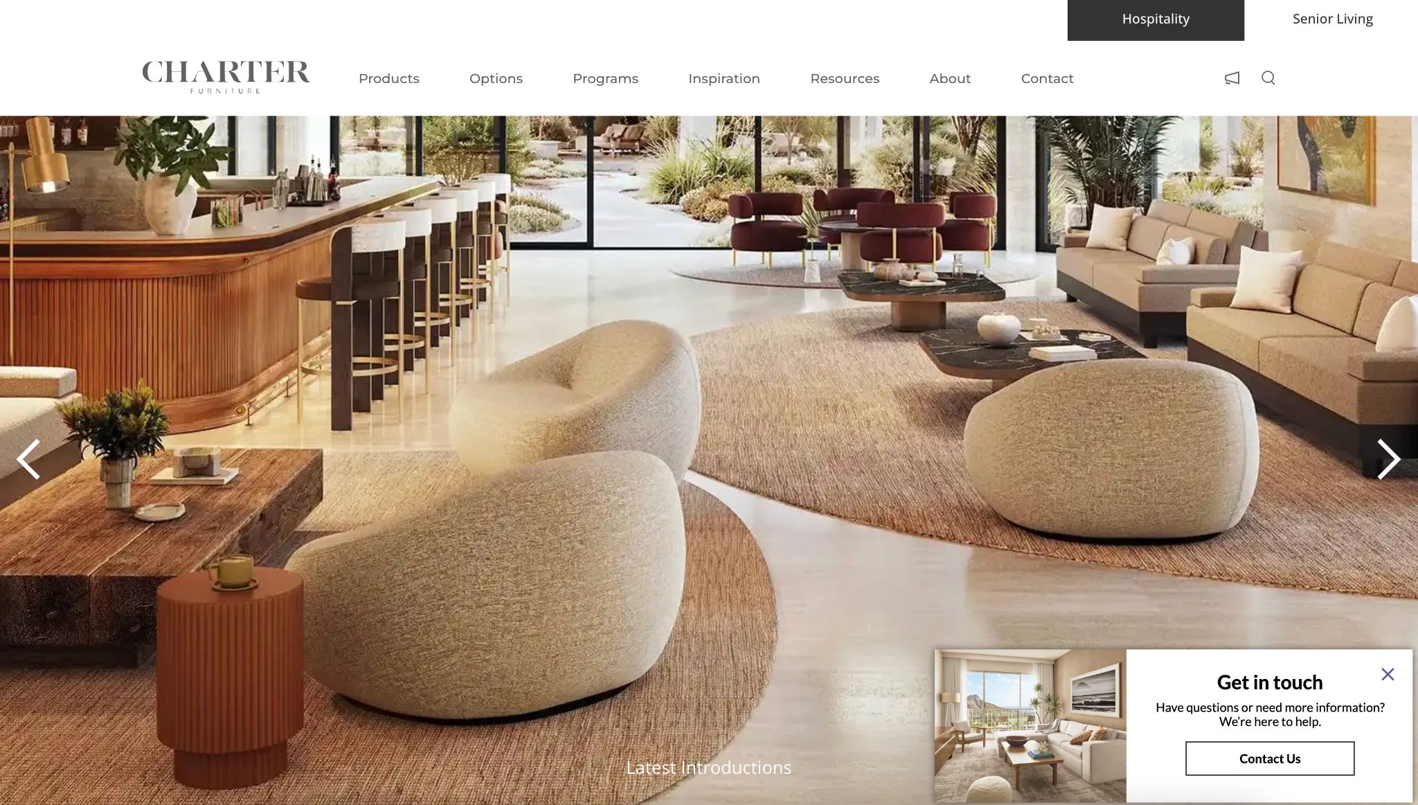Charter Furniture website showcasing luxury hospitality seating and contact information.